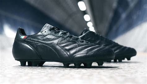 blacked out football boots.